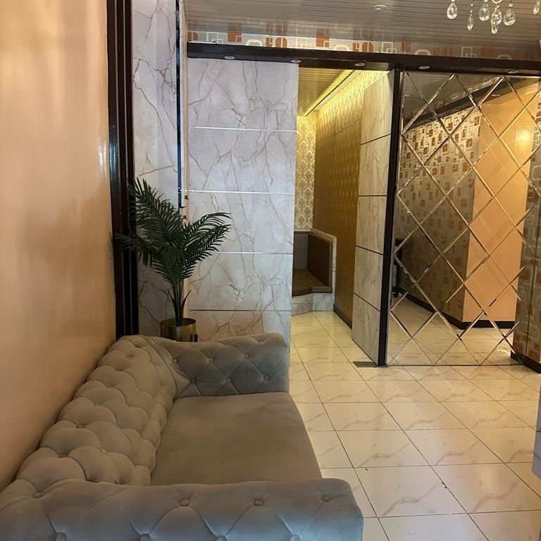 Massage bed and soft lighting at Riborn Spa Thane